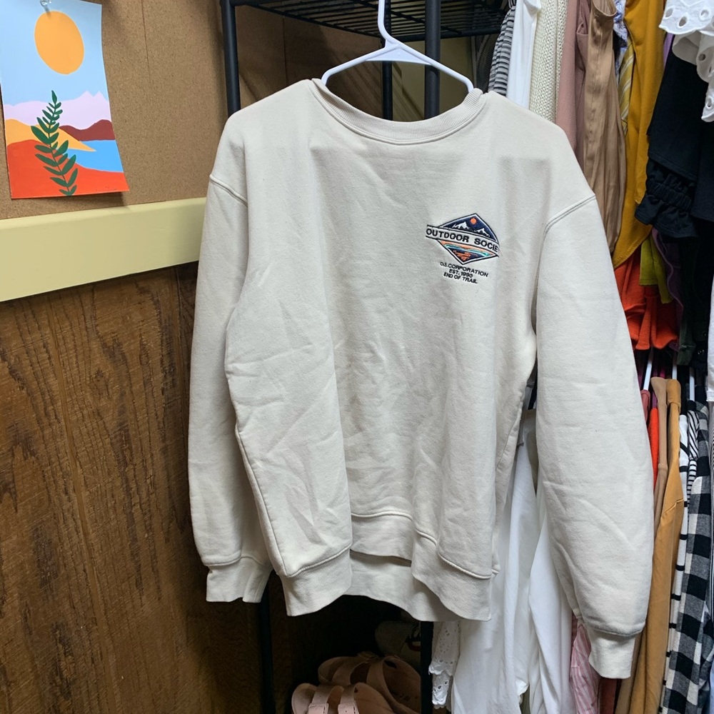 A cream sweatshirt